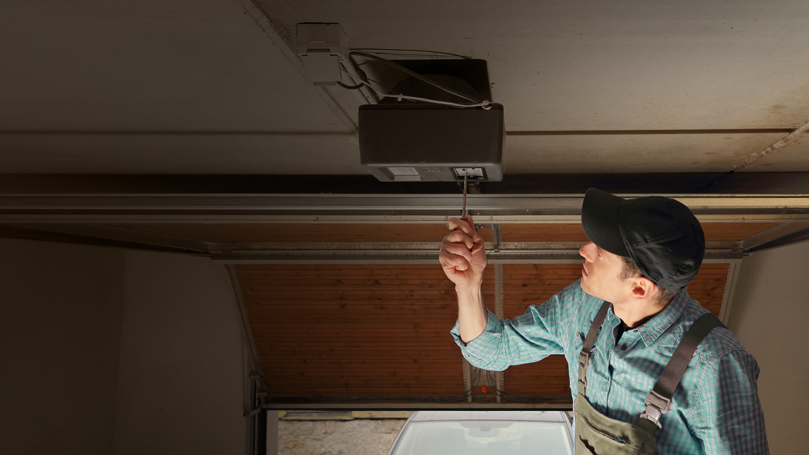 Garage door opener repair technician