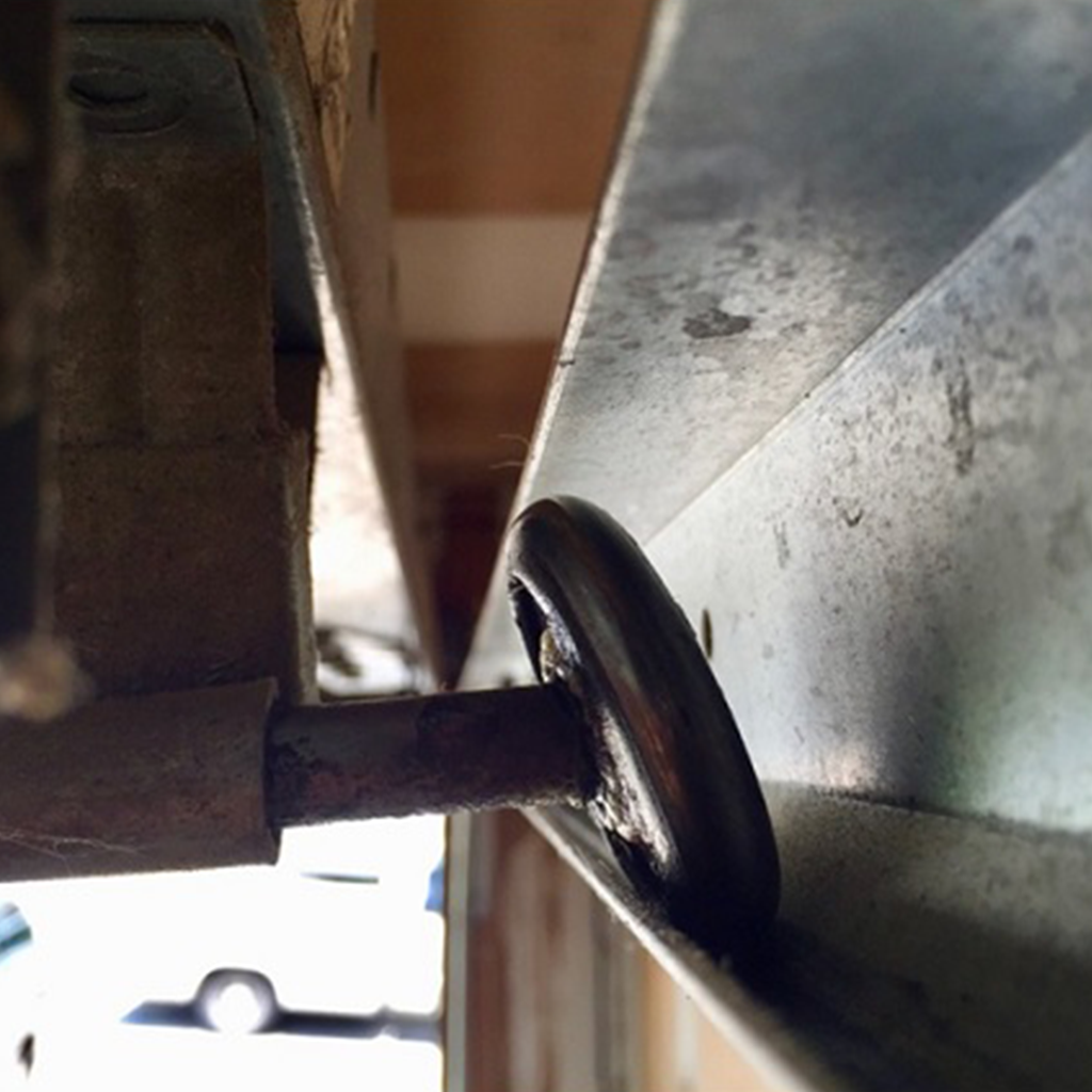 Broken garage door roller