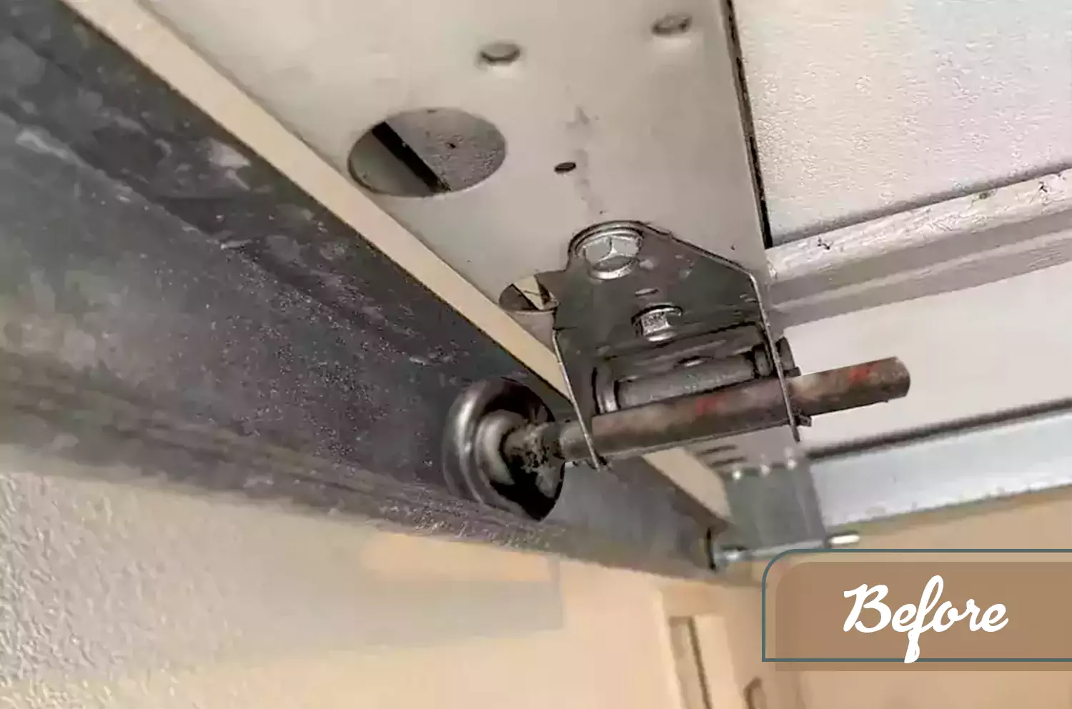 Replace garage door roller - before service