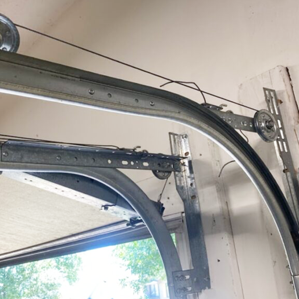 Garage door track repair